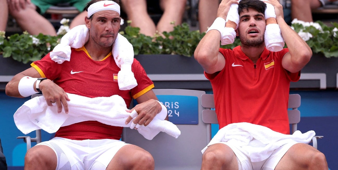 Dos generaciones del tenis unidas reflejadas en una imagen. Créditos: REUTERS/Claudia Greco.