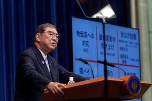 Japan's Prime Minister Shigeru Ishiba speaks during a press conference at the Prime Minister's office on April 1, 2025 in Tokyo, Japan.    Nicolas Datiche/Pool via REUTERS     TPX IMAGES OF THE DAY