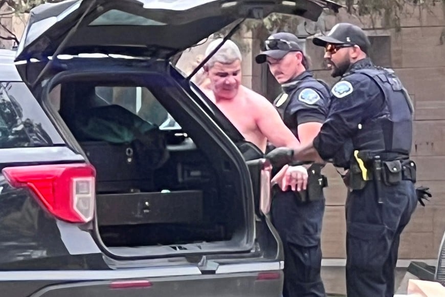 Law enforcement officers detain a suspect, after an attack that injured multiple people, in Boulder, Colorado, U.S. June 1, 2025, in this picture obtained from social media. X/@OpusObscuraX/via REUTERS THIS IMAGE HAS BEEN SUPPLIED BY A THIRD PARTY. MANDATORY CREDIT. NO RESALES. NO ARCHIVES.