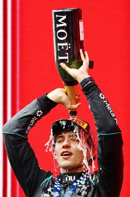 Formula One F1 - Belgian Grand Prix - Circuit de Spa-Francorchamps, Stavelot, Belgium - July 19, 2026
Mercedes' Andrea Kimi Antonelli celebrates with champagne on the podium after winning the Belgian Grand Prix REUTERS/Sarah Meyssonnier TPX IMAGES OF THE DAY