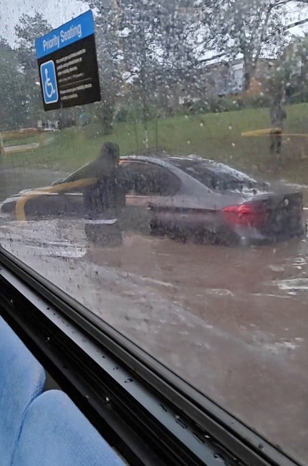 A person stands next to a car stuck on a flooded road following heavy rainfall, as seen through a bus window, in Toronto, Ontario, Canada, September 2, 2026, in this still image obtained from a social media video. @ea.eatss via Instagram/via REUTERS THIS IMAGE HAS BEEN SUPPLIED BY A THIRD PARTY. MANDATORY CREDIT. NO RESALES. NO ARCHIVES.
VERIFICATION
- Reuters was able to confirm the location and date from original file metadata.
- Building, trees, road layout and a signboard also matched archive imagery of the area.