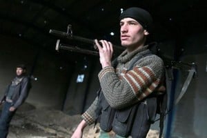 ELLITORAL_205050 |  Hispantv Integrantes de los grupos armados radicados en el centro de Siria.