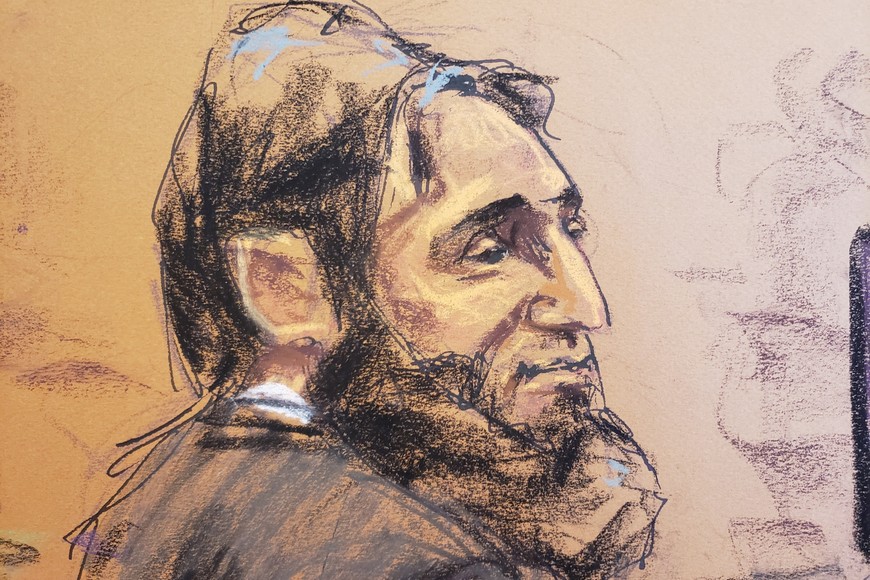Sayfullo Saipov, who used a truck to kill eight people on a Manhattan bike path in 2017, sits during his trial on murder and terrorism charges, at a courtroom in New York, U.S., January 26, 2023, in this courtroom sketch.   REUTERS/Jane Rosenberg