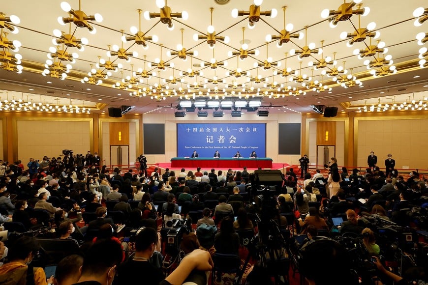 Journalists attend a news conference by Chinese Foreign Minister Qin Gang on the sidelines of the National People's Congress (NPC) in Beijing, China March 7, 2023. REUTERS/Thomas Peter