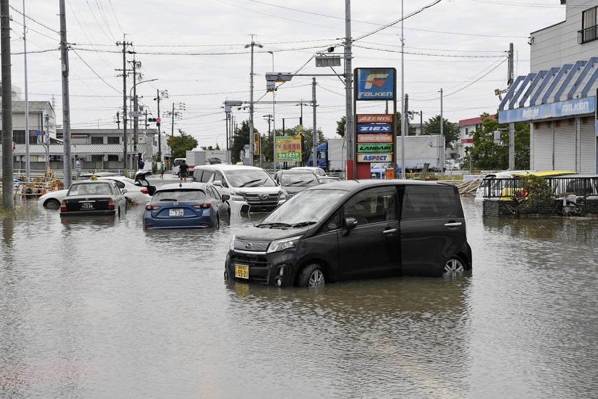 Vehicles submerged under water following heavy rain brought about by Typhoon Mawar are pictured in Toyokawa, Aichi Prefecture, central Japan in this photo taken by Kyodo on June 3, 2023.  Mandatory credit Kyodo/via REUTERS ATTENTION EDITORS - THIS IMAGE WAS PROVIDED BY A THIRD PARTY. MANDATORY CREDIT. JAPAN OUT. NO COMMERCIAL OR EDITORIAL SALES IN JAPAN