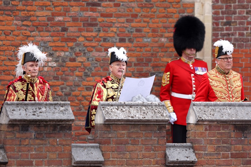 Garter Principal King of Arms, David Vines White, reads the Principal Proclamation from the balcony overlooking Friary Court after the Accession Council at St James's Palace, as King Charles III is formally proclaimed Britain's new monarch, following the death of Queen Elizabeth II, in London, Britain September 10, 2022. Richard Heathcote/Pool via REUTERS