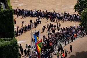 Crowds gather on Horse Guards Parade ahead of the ceremonial procession of the coffin of Queen Elizabeth II from Buckingham Palace to Westminster Hall, London. Picture date: Wednesday September 14, 2022. Victoria Jones/Pool via REUTERS
