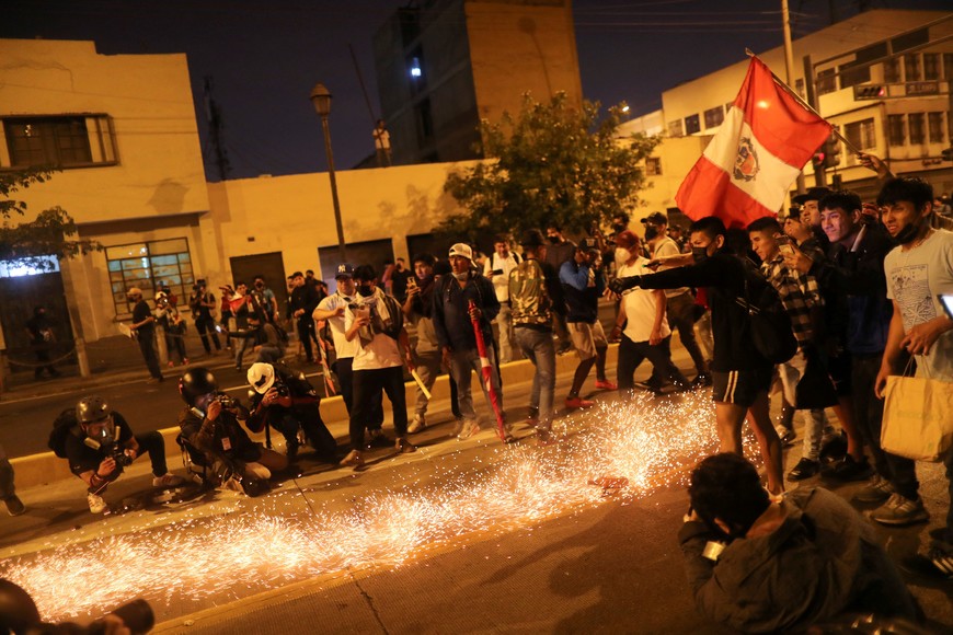 Demonstrators protest demanding the dissolution of Congress and to hold democratic elections rather than recognise Dina Boluarte as Peru's President, after the ousting of Peruvian President Pedro Castillo, in Lima, Peru December 12, 2022. REUTERS/Sebastian Castaneda