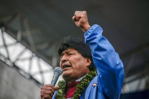 FILE PHOTO: Former Bolivian President Evo Morales speaks during a rally marking the 26th anniversary of the founding of the Movement for Socialism (MAS) party at Plaza San Francisco in La Paz, Bolivia, March 29, 2021. REUTERS/David Mercado/File Photo