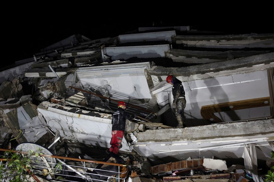 A rescue team works on a collapsed building, following an earthquake in Antakya, Turkey February 6, 2023. REUTERS/Umit Bektas