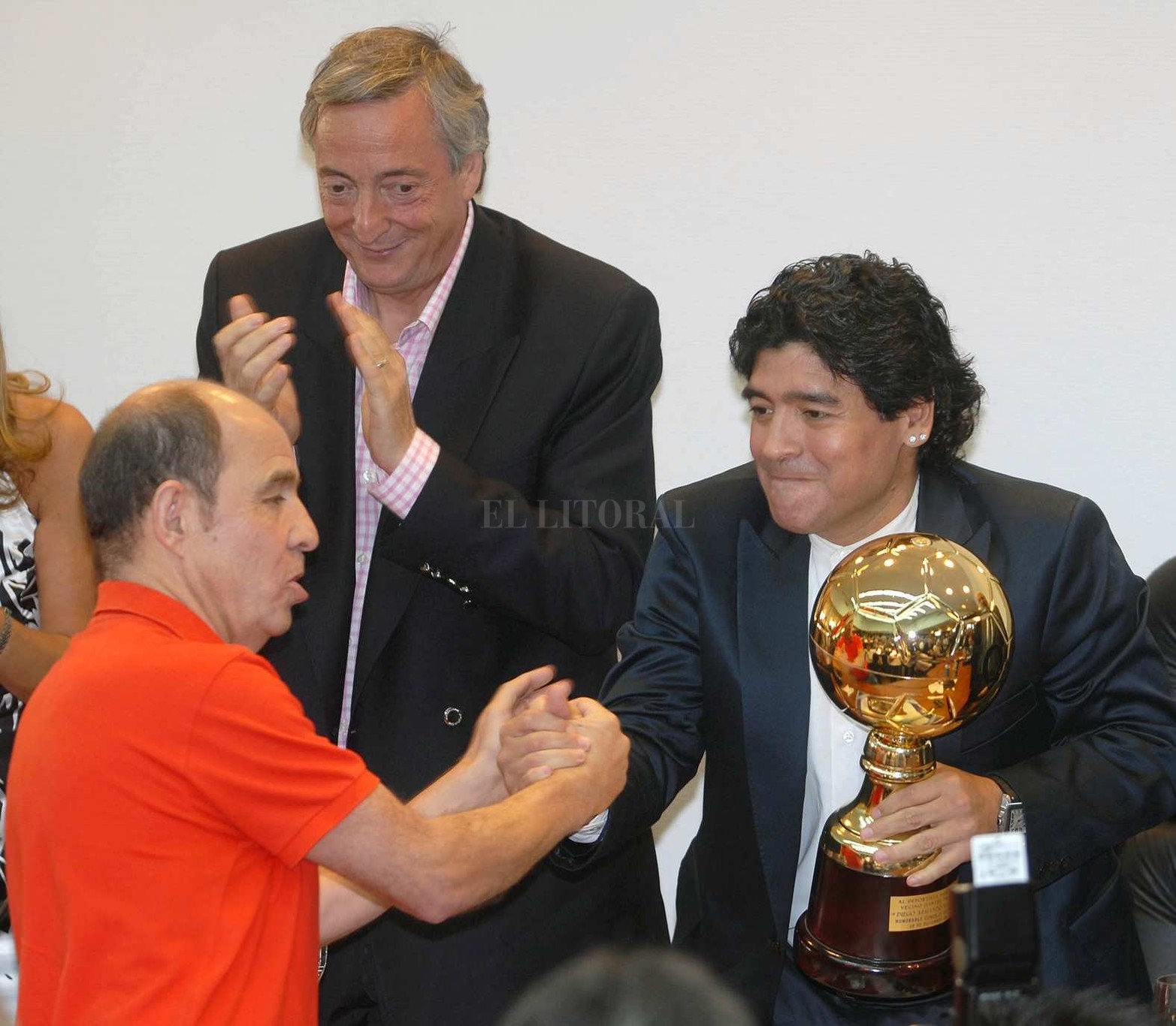 Junto a Diego Maradona y Néstor Kirchner.