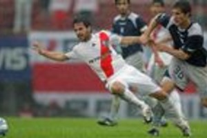 AFP River Plate's Matias Abelairas (L) vies for the ball with Franco Zuculini of Racing during their Argentina first division football match in Buenos Aires on September 28, 2008. AFP PHOTO / ALEJANDRO PAGNI