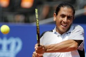 EFE OWO05 VARSOVIA (POLONIA) 10/6/2008.- El tenista argentino Guillermo Cañas le devuelve una bola al tenista peruano Luis Horna durante el encuentro del Abierto de tenis de Varsovia celebrado en Varsovia, Polonia, hoy 10 de junio de 2008. EFE/Bartlomiej Zborowski PROHIBIDO SU USO EN POLONIA