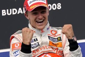 AFP McLaren Mercedes' Finnish driver Heikki Kovalainen celebrates on the podium of the Hungaroring racetrack on August 3, 2008 in Budapest after the Formula One Hungarian Grand Prix. McLaren Mercedes' Finnish driver Heikki Kovalainen won the race ahead of Toyota's German driver Timo Glock and Ferrari's Finnish driver Kimi Raikkonen. AFP PHOTO / BERTRAND GUAY