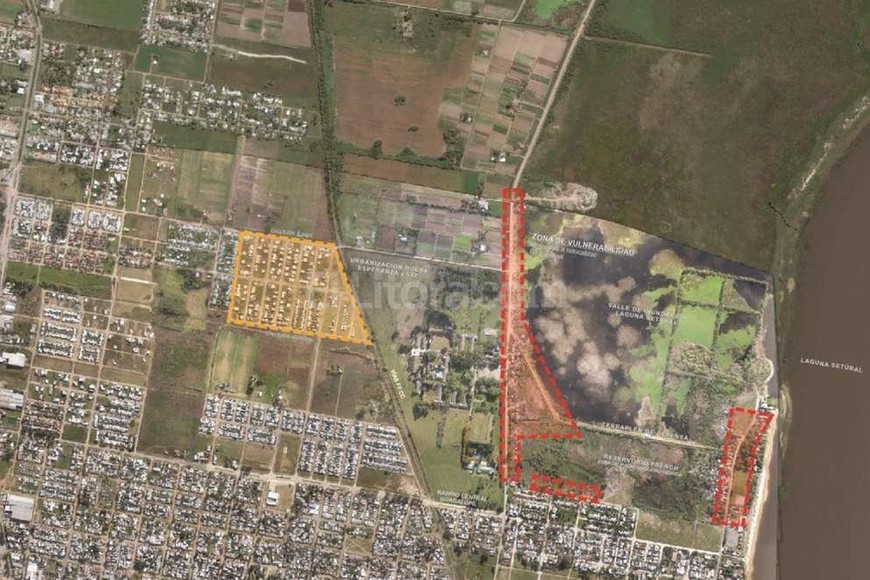 ELLITORAL_155415 |  Mauricio Garín Nueva Esperanza Este. De allí hacia acá. En rojo, la zona donde vivían y en amarillo, donde vivirán.