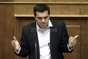 ELLITORAL_127546 |  EFE El primer ministro griego comunicó su decisión de aceptar las imposiciones de los organismos financieros.