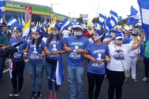 ELLITORAL_218327 |  dpa Opositores al Gobierno durante una marcha en respaldo a los obispos y en demanda de más justicia y democracia el 28/07/2018 en Managua, Nicaragua.