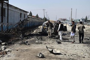 ELLITORAL_206437 |  WAKIL KOHSARAFP - El Mundo Uno de los últimos atentados con coche bomba en Kabul, el pasado 17 de marzo.