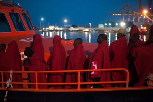 ELLITORAL_218442 |  Archivo Migrantes rescatados de las aguas del Mar Mediterráneo llegan al puerto de Málaga, España, el 18/07/2018.