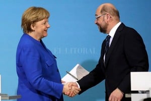 ELLITORAL_201800 |  Internet Angela Merkel y el presidente del Partido Socialdemócrata (SPD), Martin Schulz.