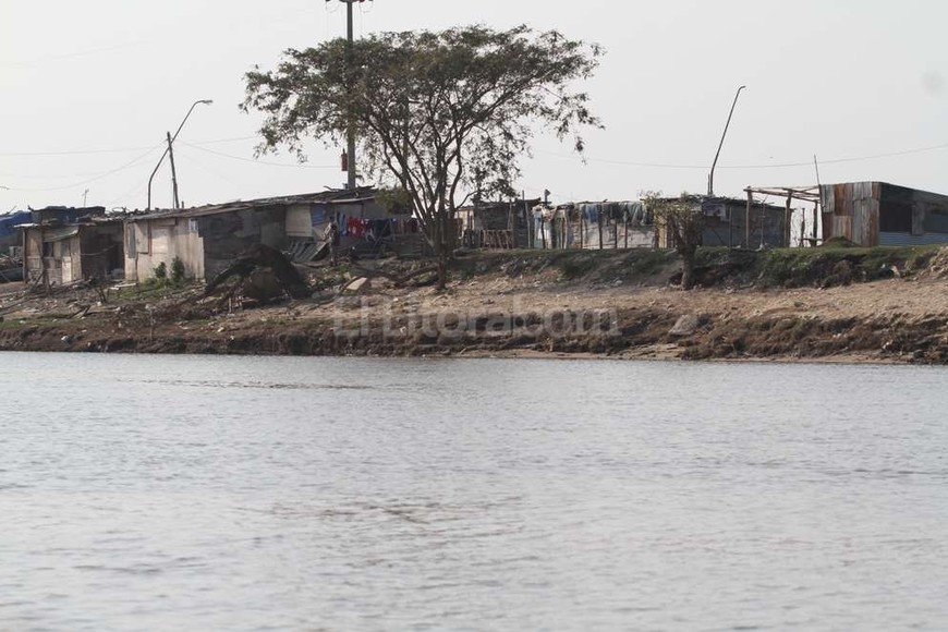 ELLITORAL_158410 | Mauricio Garín Pescadores. Los ocupantes se asentaron en terrenos y venden pescado fresco .