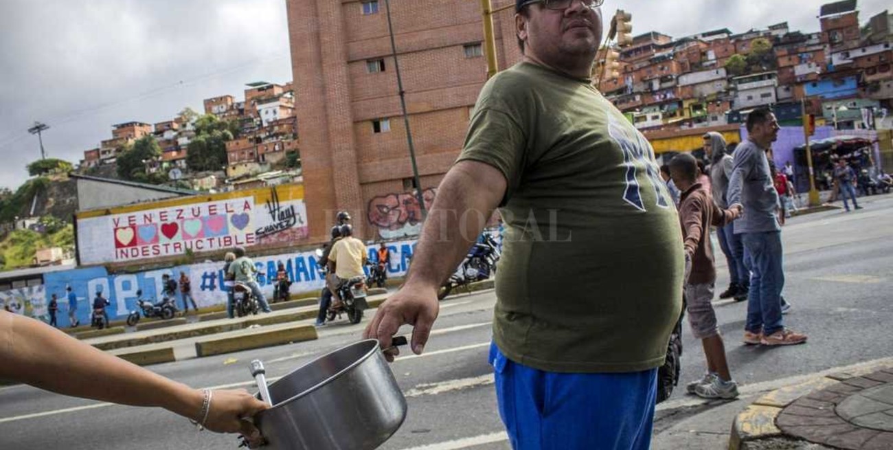 Protestas por falta de alimentos encienden el fin de año en Caracas