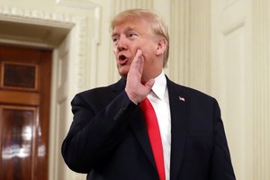 ELLITORAL_273182 |  Evan Vucci President Donald Trump talks to the media during the NCAA Collegiate National Champions Day event at the White House, Friday, Nov. 22, 2019, in Washington. (AP Photo/ Evan Vucci)