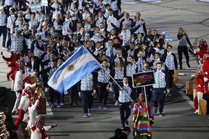 ELLITORAL_258001 |  Gabriel Heusi Lima, Friday July 26, 2019 - The delegation of Argentina is led by athlete Javier Conte during the opening ceremony at the National Stadium at the Lima 2019 Pan American Games.
Copyright  Gabriel Heusi / Lima 2019

Mandatory credits: Lima 2019
** NO SALES ** NO ARCHIVES **