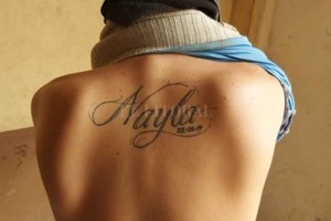 ELLITORAL_364910 |  Gentileza Yoyo fue detenido este martes, este tatuaje tiene en su espalda.
