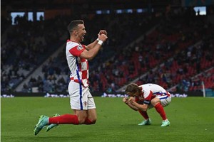ELLITORAL_385175 |  Gentileza @EURO2020 Nikola Vlasic, Luka Modric e Ivan Perisic marcaron para la victoria de Croacia