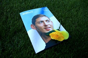 ELLITORAL_237561 |  DPA 02 February 2019, England, Cardiff: A view of the match day programme with an image of Emiliano Sala on the cover, prior to the English Premier League soccer match between Cardiff City and AFC Bournemouth. The PA 46 Malibu plane with the 28-year-old Argentinian striker Emiliano Sala and pilot David Ibbotson on board disappeared from radar on the 28 of January. Photo: Mark Kerton/PA Wire/dpa