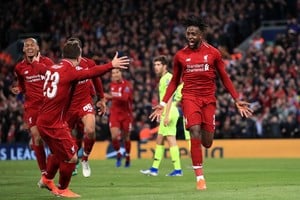 ELLITORAL_246492 |  DPA 07 May 2019, England, Liverpool: Liverpool's Divock Origi (R) celebrates scoring his side's fourth goal during the UEFA Champions League semi-final second leg soccer match between Liverpool and Barcelona at Anfield stadium. Photo: Peter Byrne/PA Wire/dpa