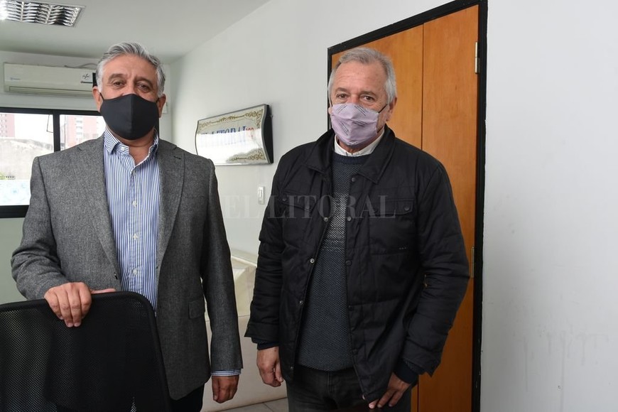 ELLITORAL_395632 |  Flavio Raina Sergio Winkelmann y Juan Manuel Campana:  La vivienda es la obra pública que más empuja a la economía .