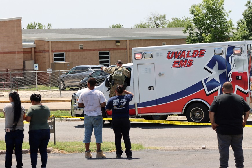 An ambulance is positioned outside the school during a mass shooting at Robb Elementary School where a gunman killed nineteen children and two adults in Uvalde, Texas, U.S. May 24, 2022. Picture taken May 24, 2022.  Pete Luna/Uvalde Leader-News/Handout via REUTERS 
THIS IMAGE HAS BEEN SUPPLIED BY A THIRD PARTY. NO RESALES. NO ARCHIVES. MANDATORY CREDIT