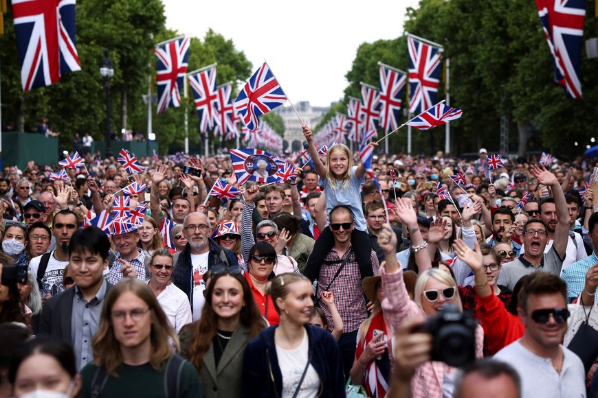 People gather in The Mall during the celebration of Britain's Queen Elizabeth's Platinum Jubilee, in London, Britain June 2, 2022. REUTERS/Henry Nicholls