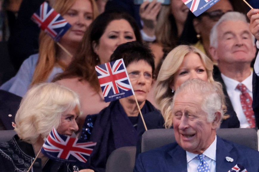 Britain's Prince Charles and Camilla, Duchess of Cornwall react during BBC's Platinum Party at the Palace to celebrate the Queen's Platinum Jubilee in front of Buckingham Palace, London, Britain June 4, 2022. Chris Jackson/Pool via REUTERS