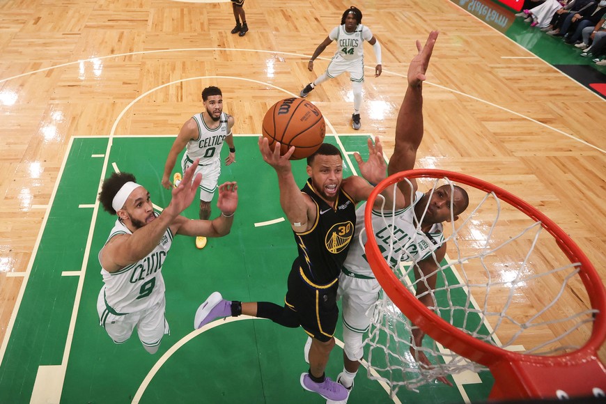Jun 10, 2022; Boston, Massachusetts, USA; Golden State Warriors guard Stephen Curry (30) attempts a layup against Boston Celtics center Al Horford (42) during the first quarter of game four in the 2022 NBA Finals at the TD Garden.  Mandatory Credit: Elsa/Pool Photo-USA TODAY Sports
