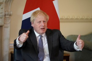 British Prime Minister Boris Johnson gestures during his meeting with Portuguese Prime Minister Antonio Costa, at 10 Downing Street, London, Britain, June 13, 2022. Aaron Chown/Pool via REUTERS