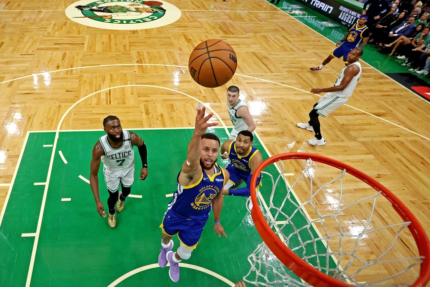 Jun 16, 2022; Boston, Massachusetts, USA; Golden State Warriors guard Stephen Curry (30) shoots the ball against Boston Celtics guard Jaylen Brown (7) in game six of the 2022 NBA Finals at TD Garden. Mandatory Credit: Kyle Terada-USA TODAY Sports     TPX IMAGES OF THE DAY