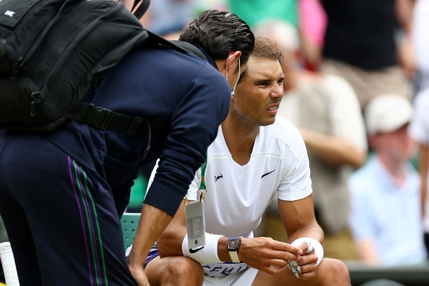 Tennis - Wimbledon - All England Lawn Tennis and Croquet Club, London, Britain - July 6, 2022 
Spain's Rafael Nadal reacts during his quarter final match against Taylor Fritz of the U.S. REUTERS/Hannah Mckay