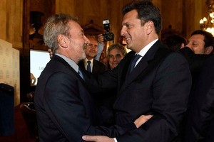 Aliados. El "superministro" Sergio Massa junto al empresario Daniel Vila, presidente del Grupo América.