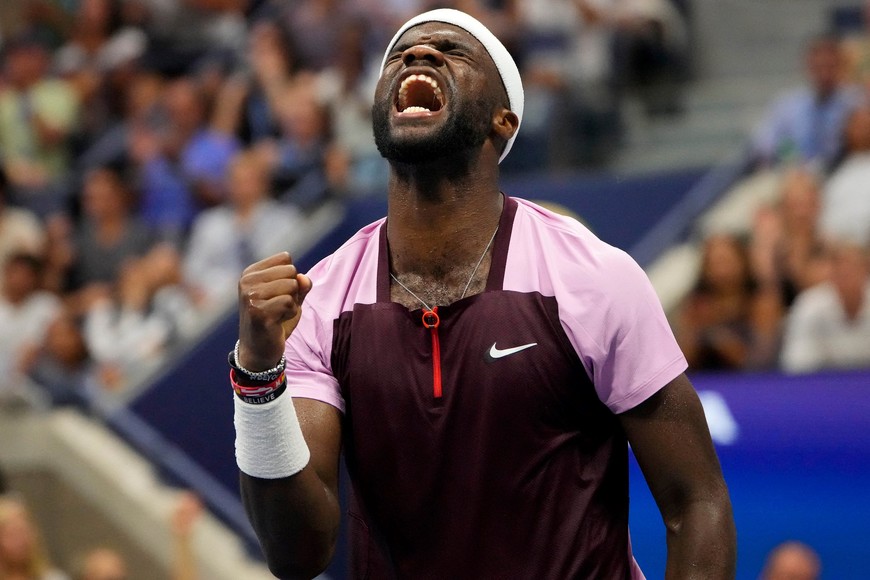 Sept 5, 2022; Flushing, NY, USA;  Frances Tiafoe of the USA celebrates after breaking the serve of Rafael Nadal of Spain on day eight of the 2022 U.S. Open tennis tournament at USTA Billie Jean King National Tennis Center. Mandatory Credit: Robert Deutsch-USA TODAY Sports