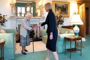 Queen Elizabeth welcomes Liz Truss during an audience where she invited the newly elected leader of the Conservative party to become Prime Minister and form a new government, at Balmoral Castle, Scotland, Britain September 6, 2022. Jane Barlow/Pool via REUTERS