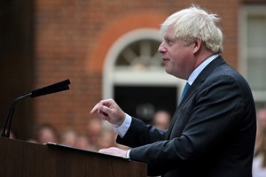 Outgoing British Prime Minister Boris Johnson delivers a speech on his last day in office, outside Downing Street, in London, Britain, September 6, 2022. Justin Tallis/Pool via REUTERS