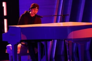 Justin Bieber performs his song "Peaches" during the 64th Annual Grammy Awards show in Las Vegas, Nevada, U.S. April 3, 2022.    REUTERS/Mario Anzuoni