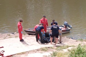 El cuerpo hallado en las aguas del Carcarañá es del presunto femicida.