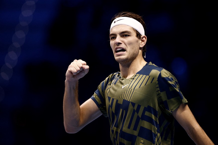 Tennis - ATP Finals Turin - Pala Alpitour, Turin, Italy - November 13, 2022
Taylor Fritz of the U.S. celebrates winning his first set during his group stage match against Spain's Rafael Nadal REUTERS/Guglielmo Mangiapane