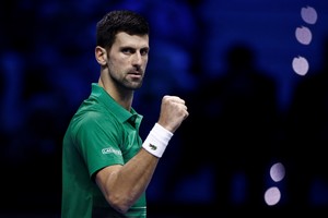 Tennis - ATP Finals Turin - Pala Alpitour, Turin, Italy - November 14, 2022
Serbia's Novak Djokovic celebrates after winning his group stage match against Greece's Stefanos Tsitsipas REUTERS/Guglielmo Mangiapane