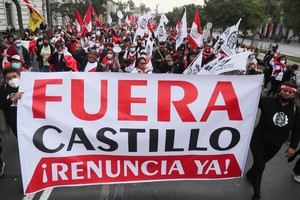 Demonstrators take part in a protest against Pedro Castillo's government, in Lima, Peru, June 4, 2022. REUTERS/Sebastian Castaneda