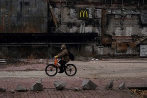 The logo of a damaged McDonald's restaurant sits at the Fabrika shopping mall, in Kherson, Ukraine November 18, 2022. REUTERS/Murad Sezer
